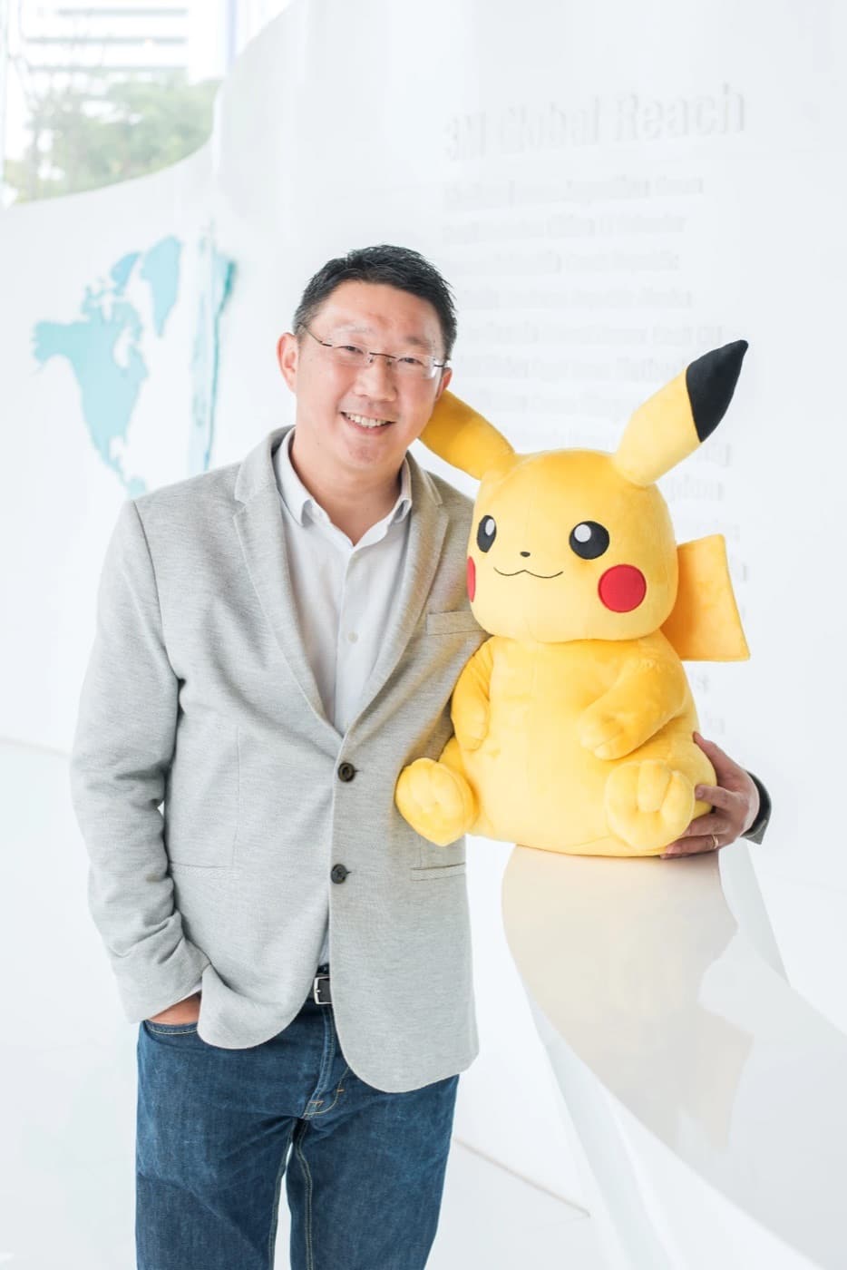 Tanin Tiranaswadi, founder of Rights Cracker, with a Pikachu plush
